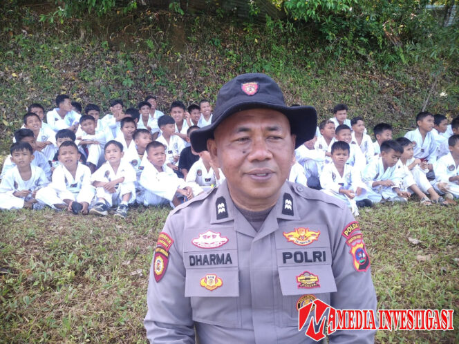 
					Sosok polisi yang berhasil mengantarkan muridnya menyabet belasan mendali pada kejuaraan Taekwondo