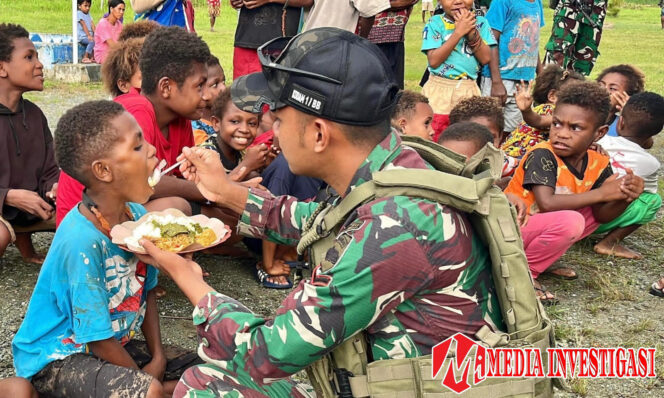 
					Satgas Yonif 131/Brajasakti Berbagi Makan Bergizi Sehat di Kampung Skofrow Perbatasan Papua