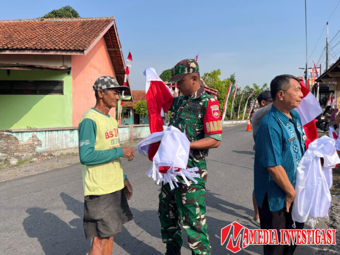 
					Sambut HUT RI ke-80, Koramil dan Forkopimcam Kemusu Bagikan Bendera Merah Putih Ke Masyarakat