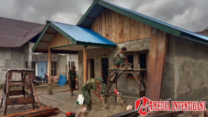 
					Satgas TMMD ketika melakukan tugas dalam kondisi apapun. (Dok. Istimewa)
