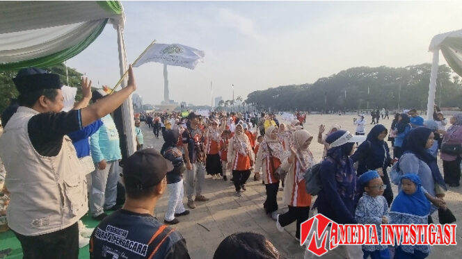 
					HUT BKPRMI di Monas dengan mengadakan acara Fun Walk. (dok. Shendy Marwan)