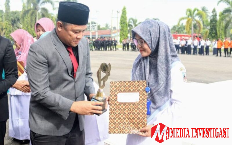 Ketua DPRD Dharmasraya Hadiri Upacara Peringatan Hari Pahlawan ke-80 dan Hari Kesehatan Nasional ke-61
